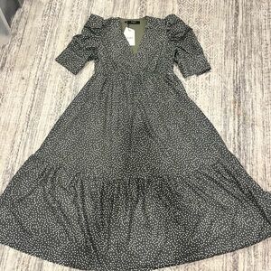 Elegant Black and White Polka Dot Midi Dress